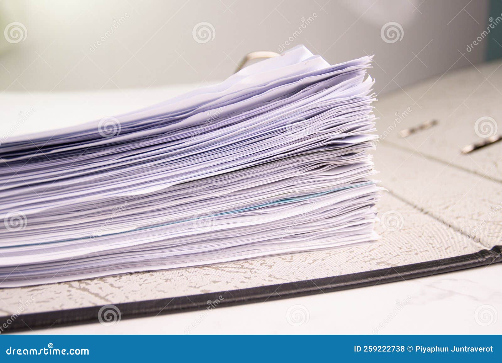 White Paper Stack in Folder File for a Business Contract,