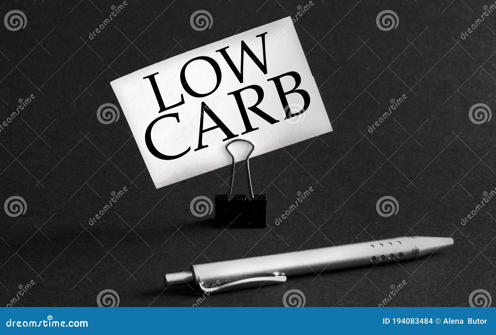 White Paper with Text Low Carb on a Black Background with Stationery ...