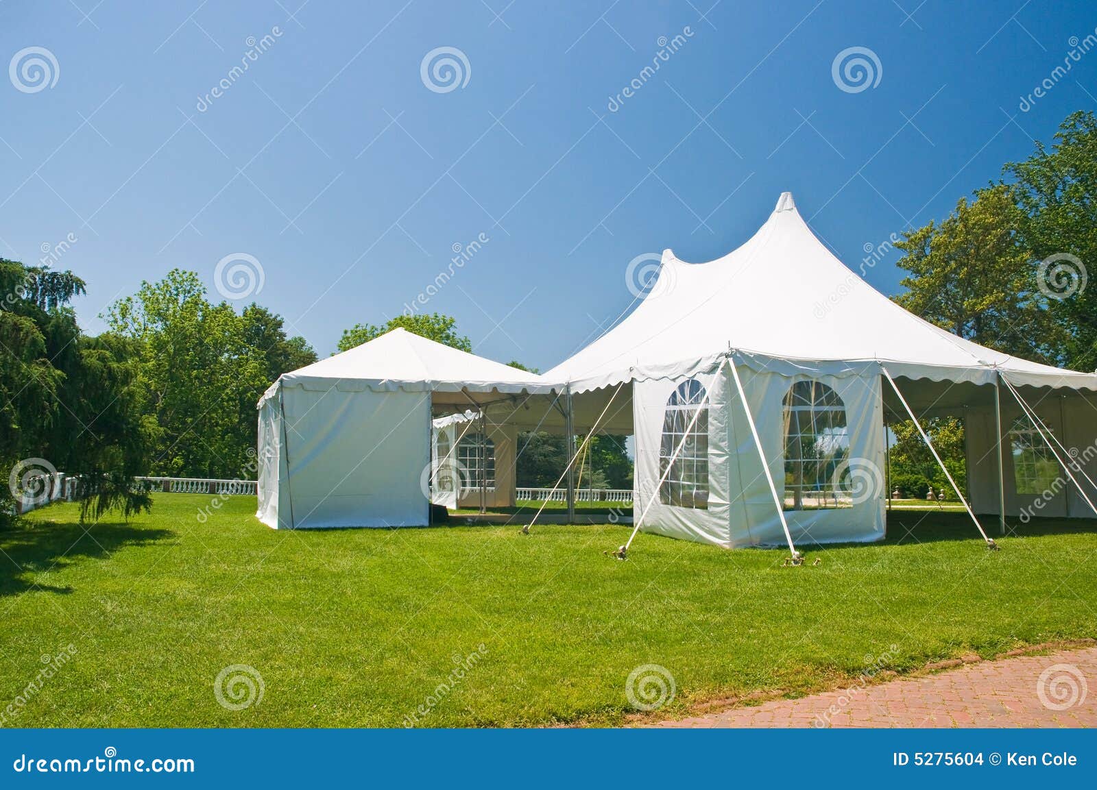 white party or event tent on lawn