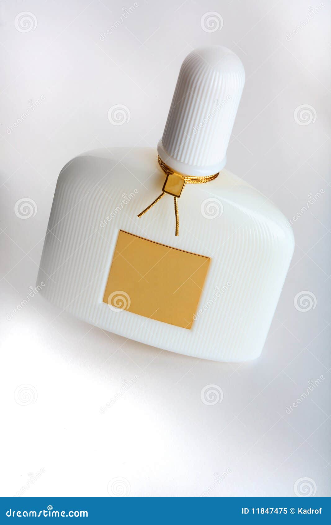 White perfume bottle with soft shadows