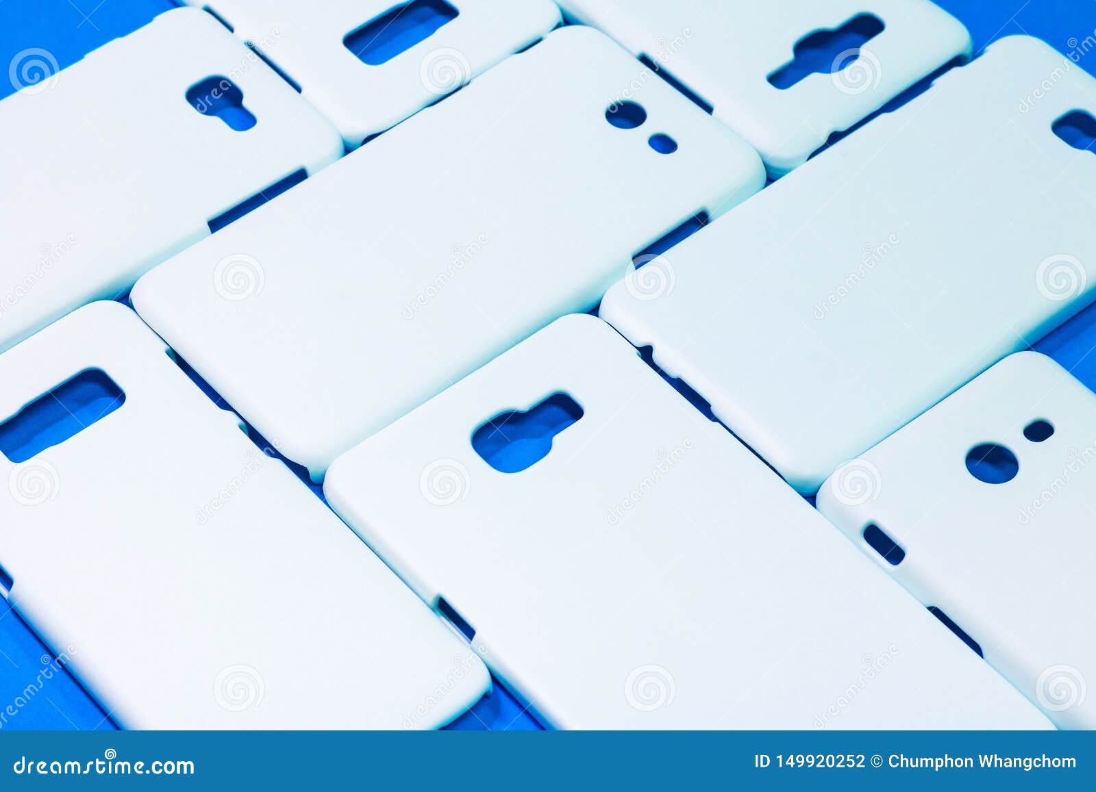 White Phone Cases on Vivid Blue Background. Mobile Cases or Smartphone