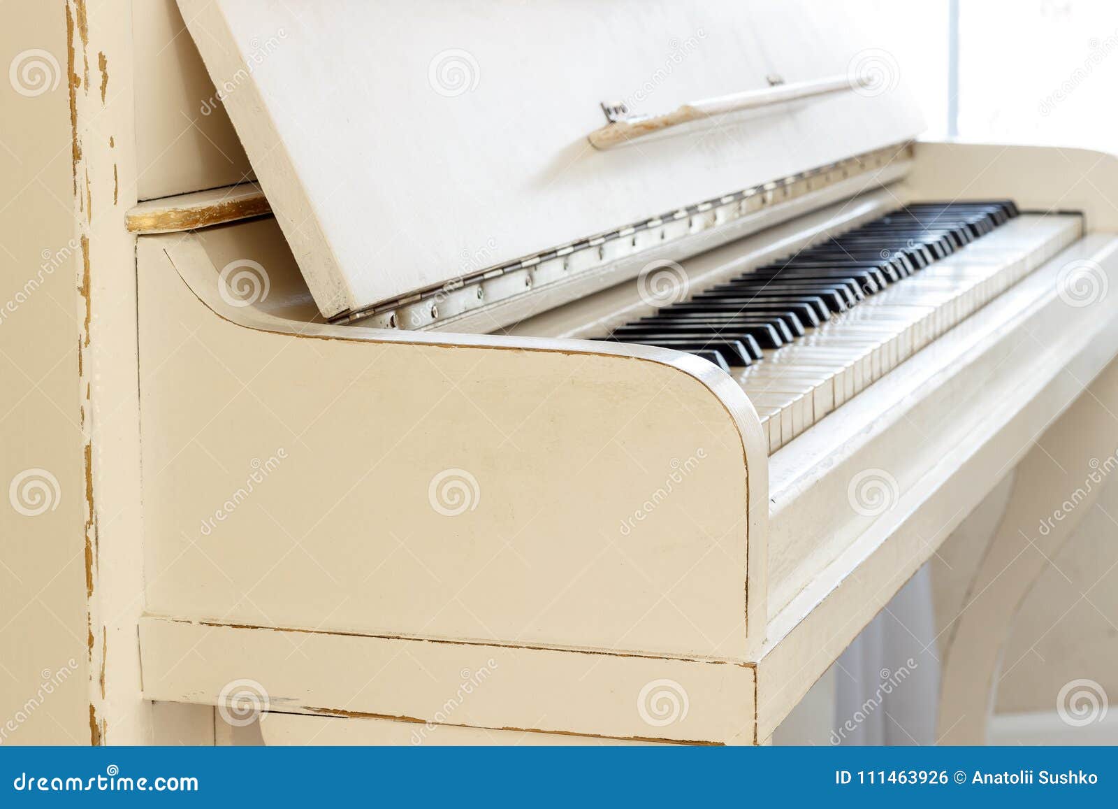 white piano, side view of instrument, musical instrument. learn