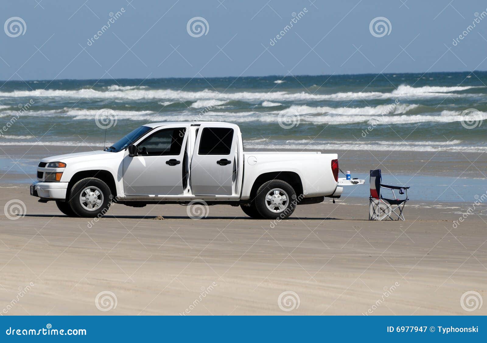 White Pickup Truck On The Beach Royalty Free Stock Photography Image