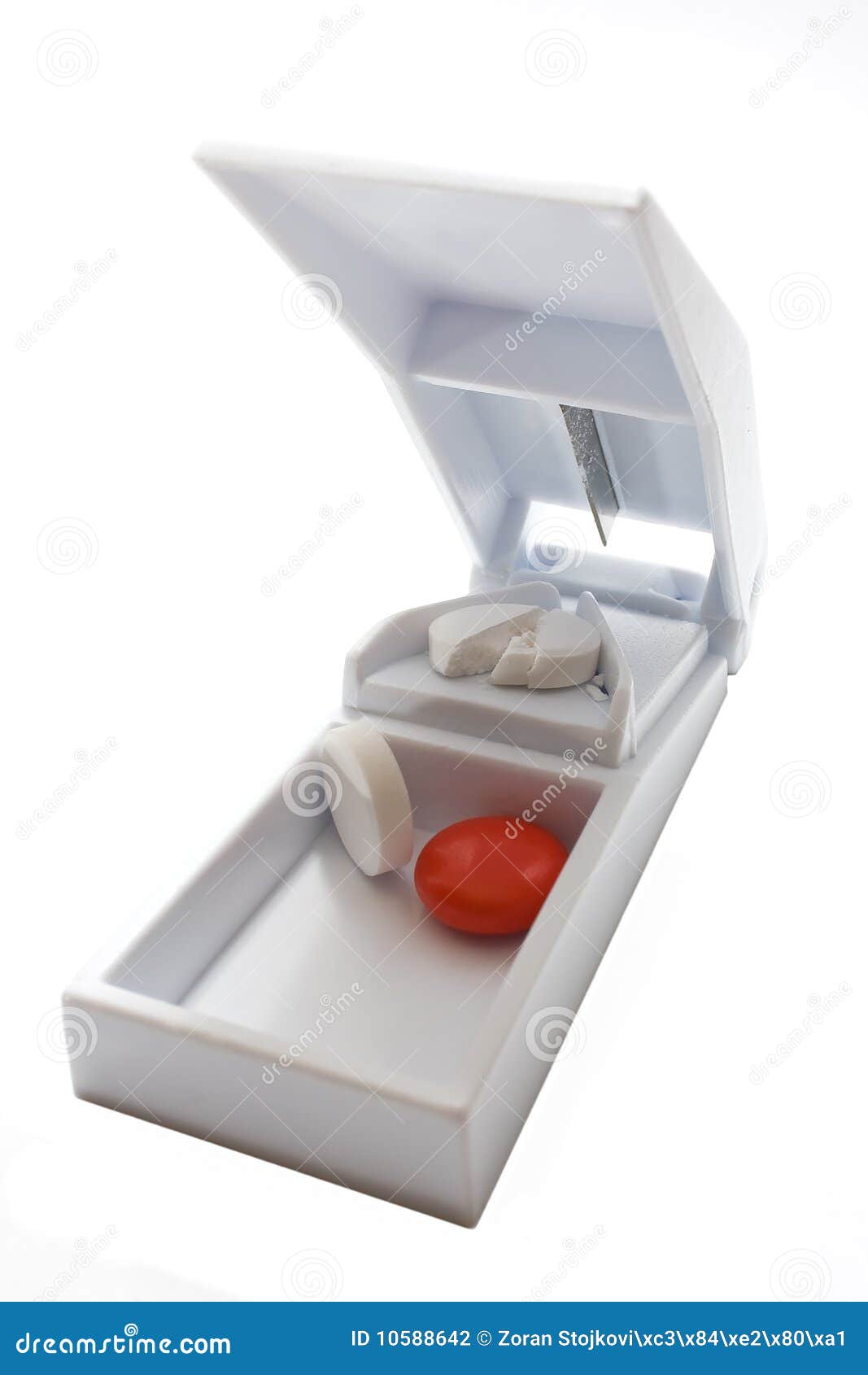 White pill cutter stock photo. Image of split, medication 10588642