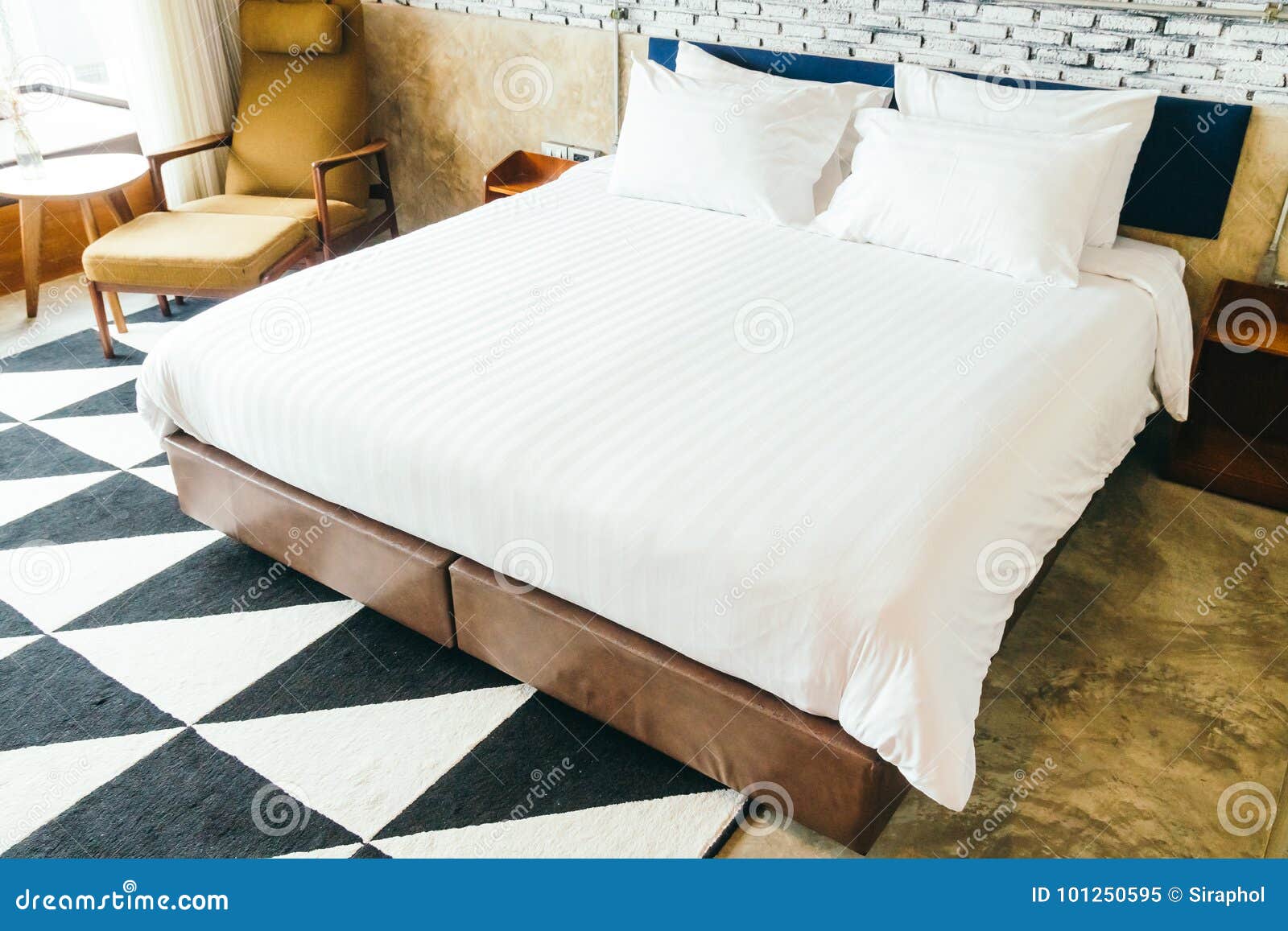 White pillow on bed stock image. Image of comfort, pillows 101250595
