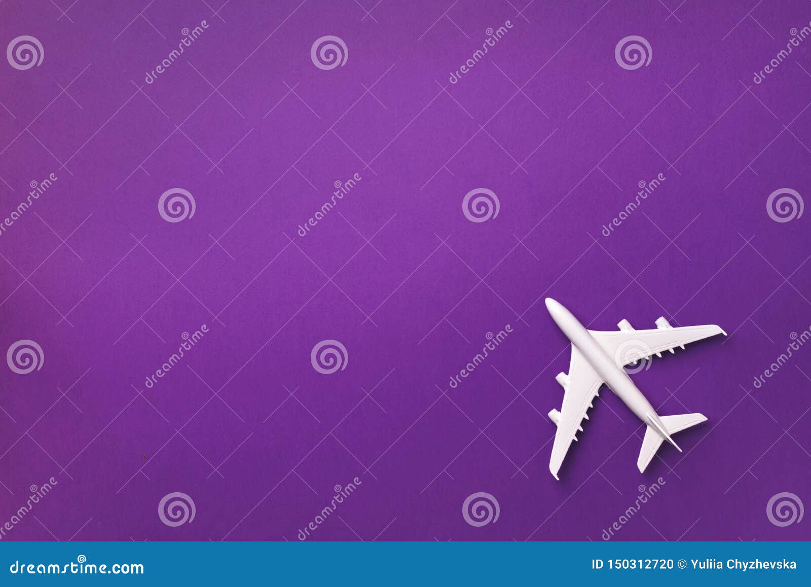 White Plane, Airplane On Violet Color Background With Copy Space. Top