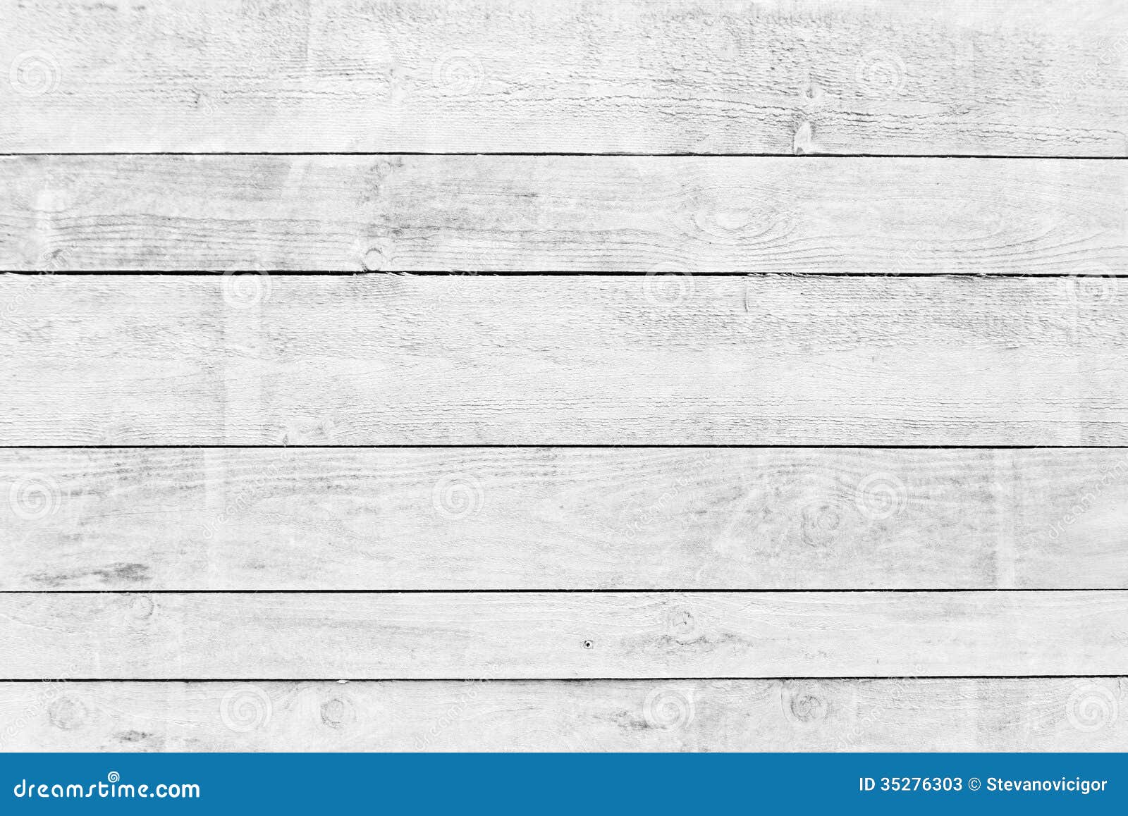 White wood planks texture with natural patterns background.