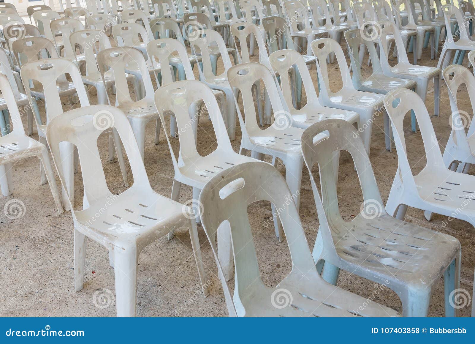 White Plastic Chairs in Celebration and Outdoor Event. Stock Photo