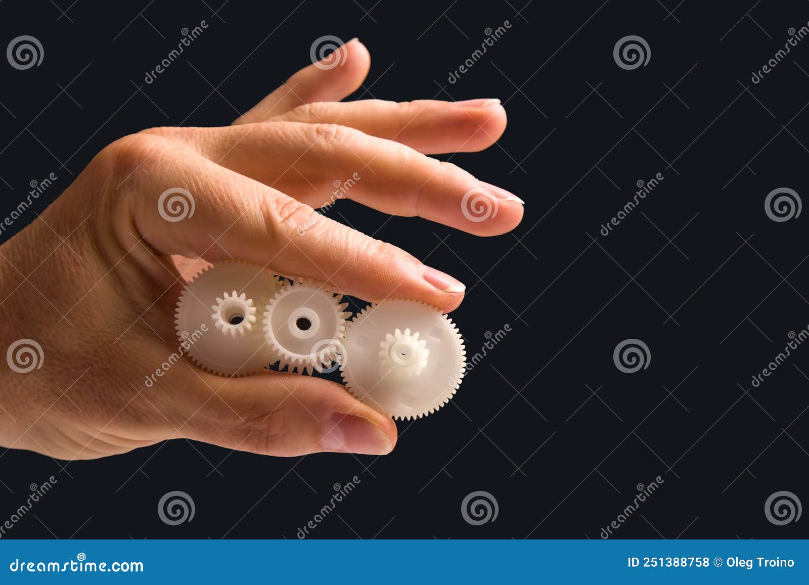 White Plastic Gears in Hand. Machine Motion Transmission Mechanism