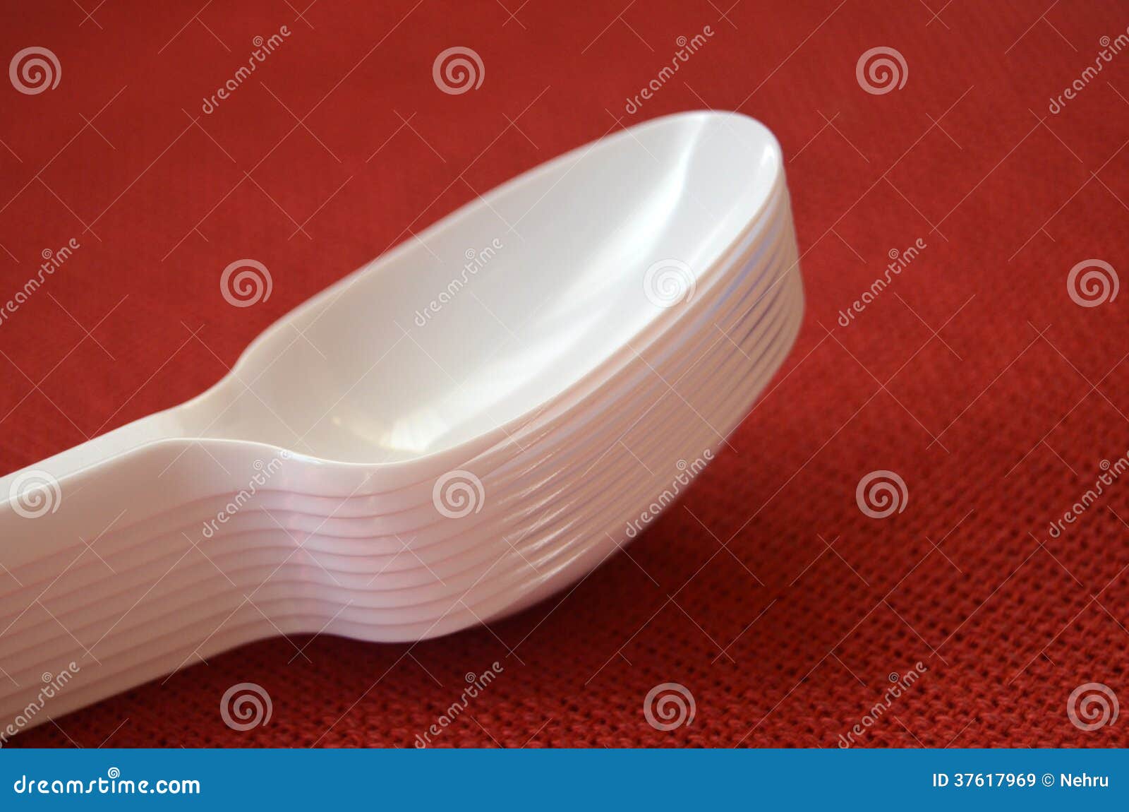 White plastic spoons stock image. Image of blue, cooking 37617969