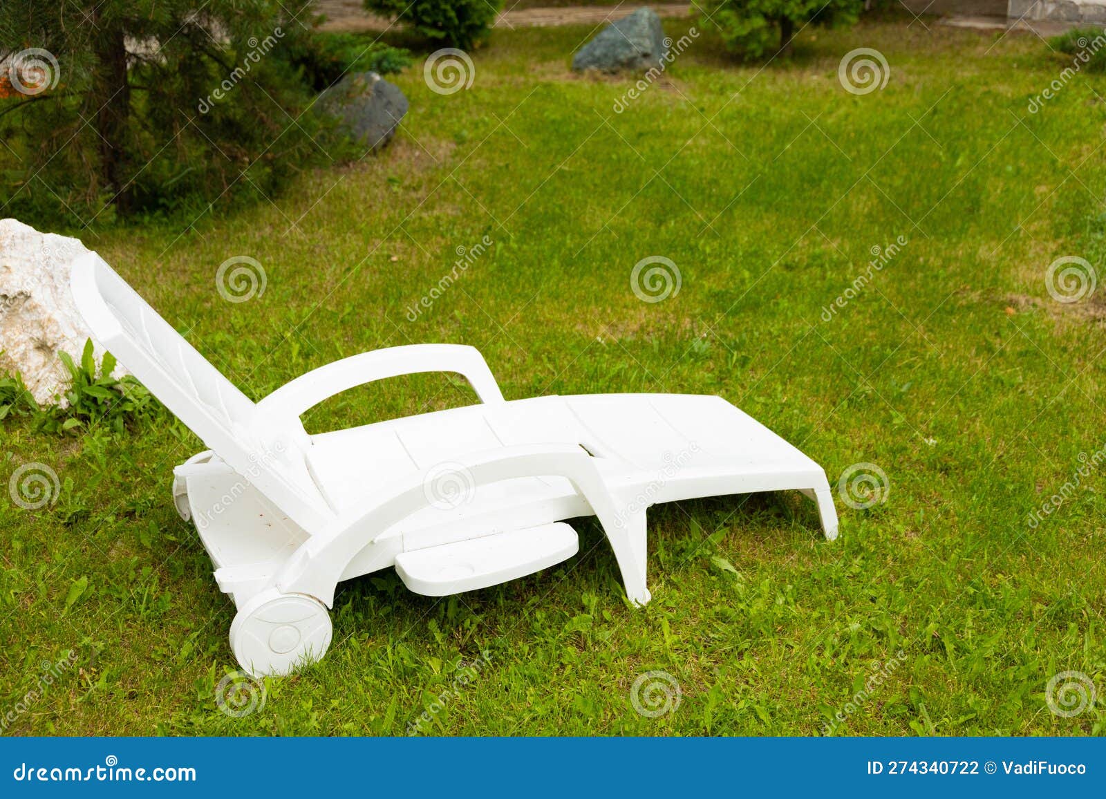 White Plastic Sun Lounger on a Green Lawn Stock Photo Image of garden