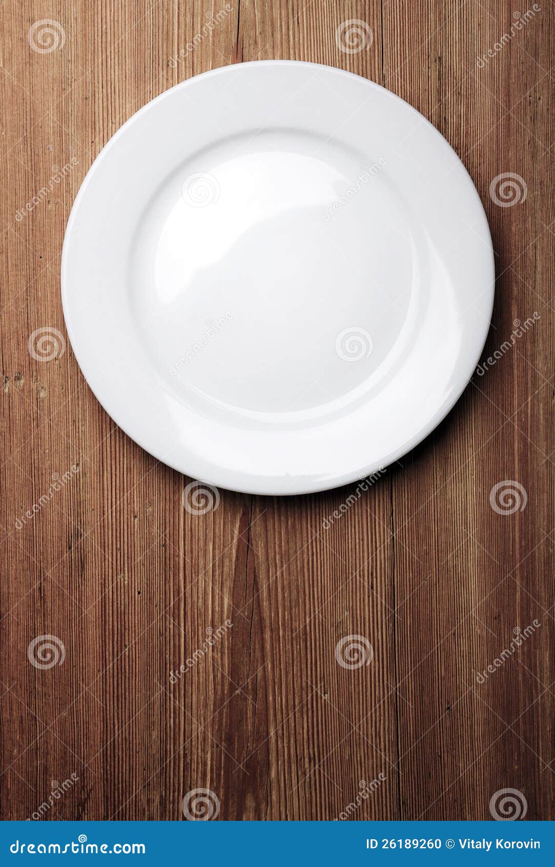 White plate on wood table stock photo. Image of wooden 26189260