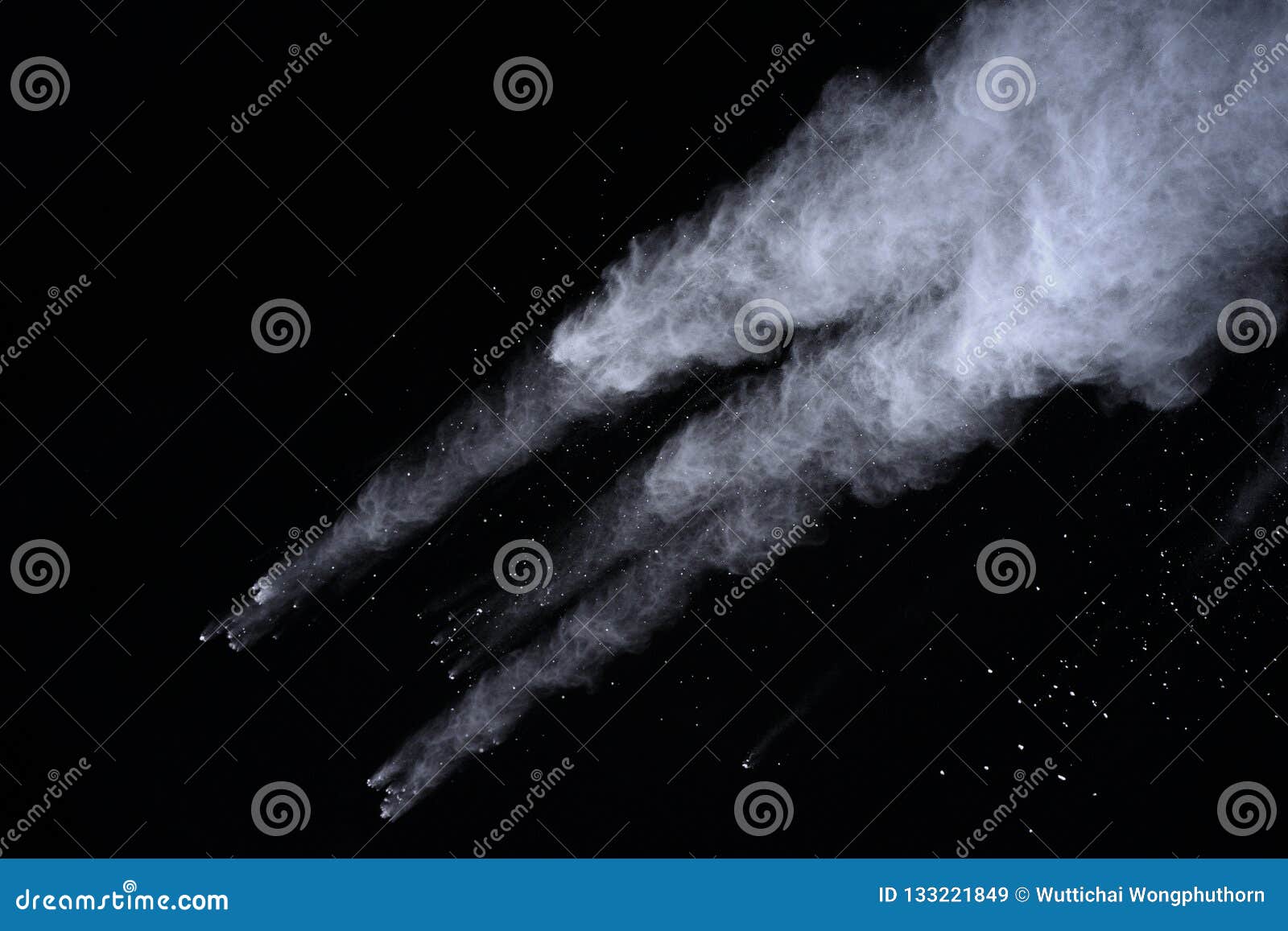 white powder explosion on black background. colored cloud. colorful dust explode. paint holi