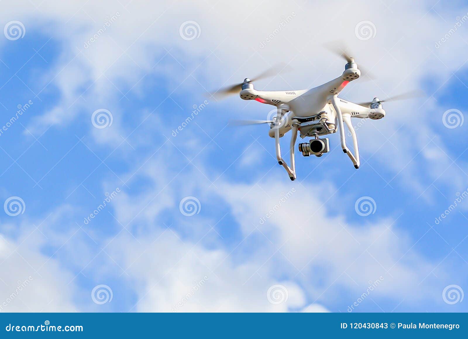 White Quadcopter Drone with Camera in a Blue Sky Stock Image Image of