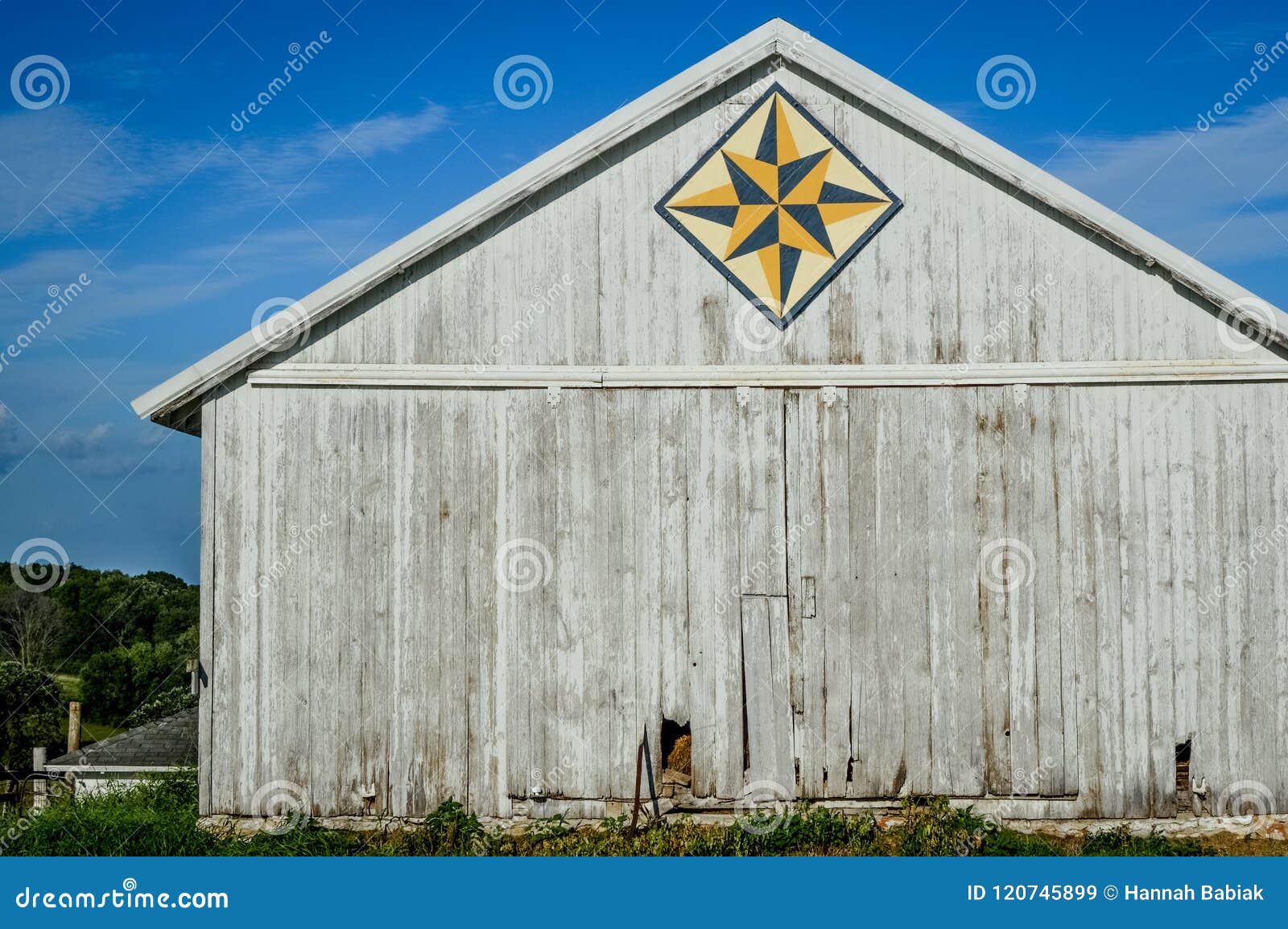White Quilt Barn with Geometric Star Pattern Stock Image Image of