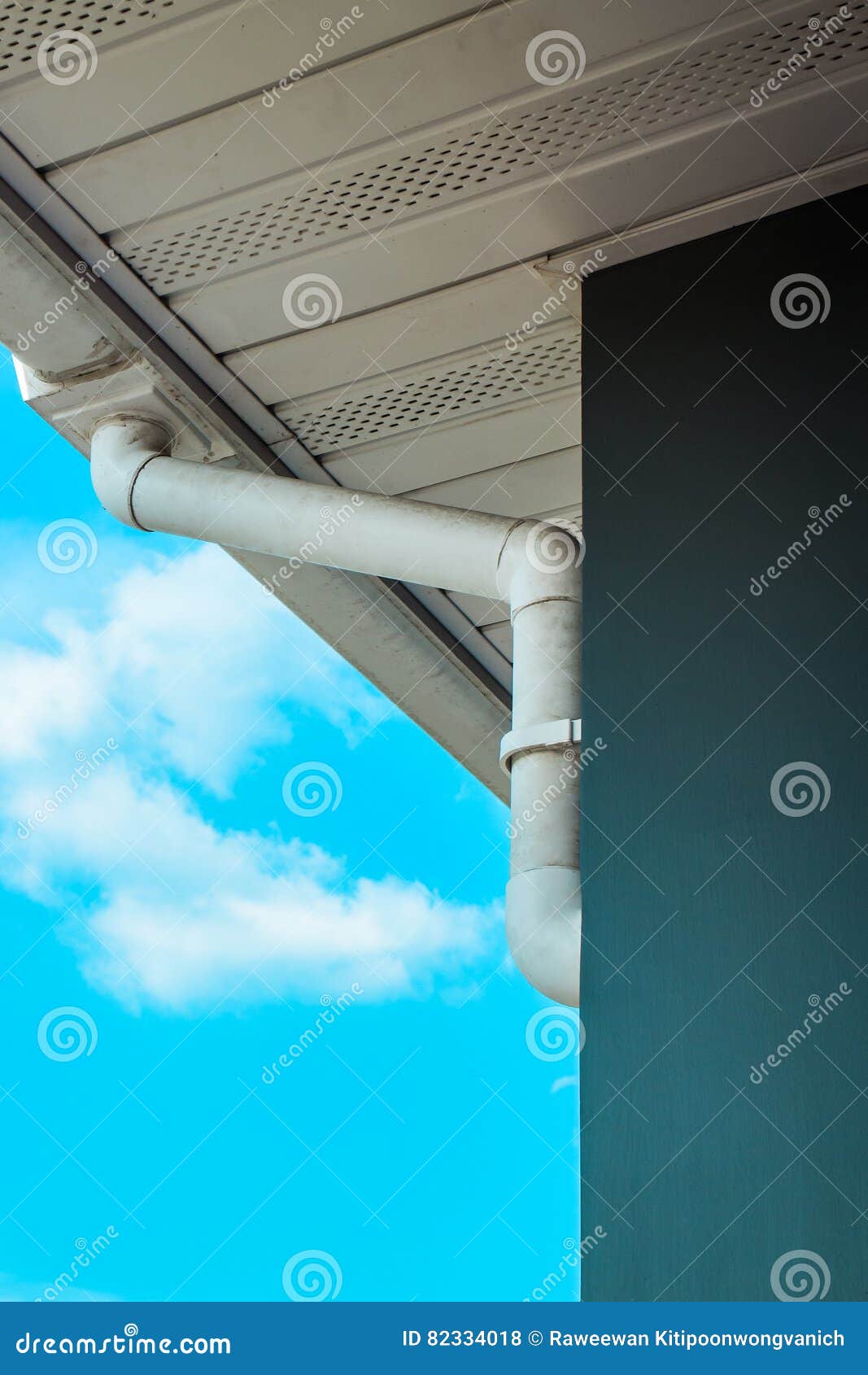 White Rain Gutter. Drainage System with Plastic Siding Soffits and