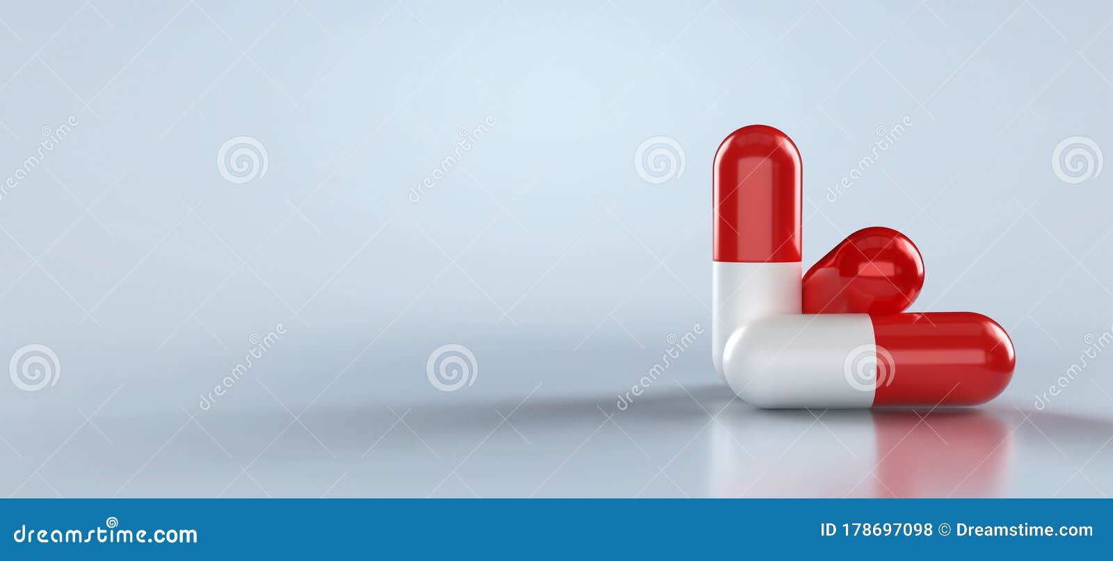 White and Red Painkiller Tablets on a Medical Background. Capsule