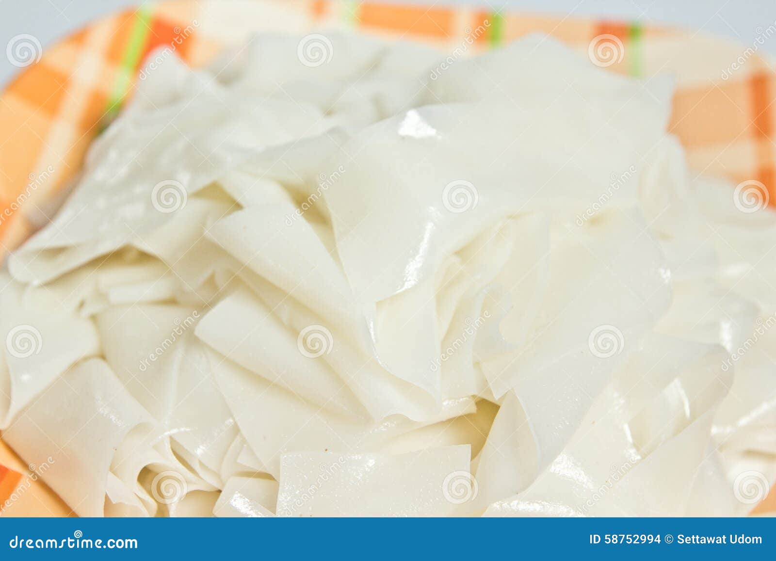 White rice noodles on dish stock photo. Image of roll 58752994