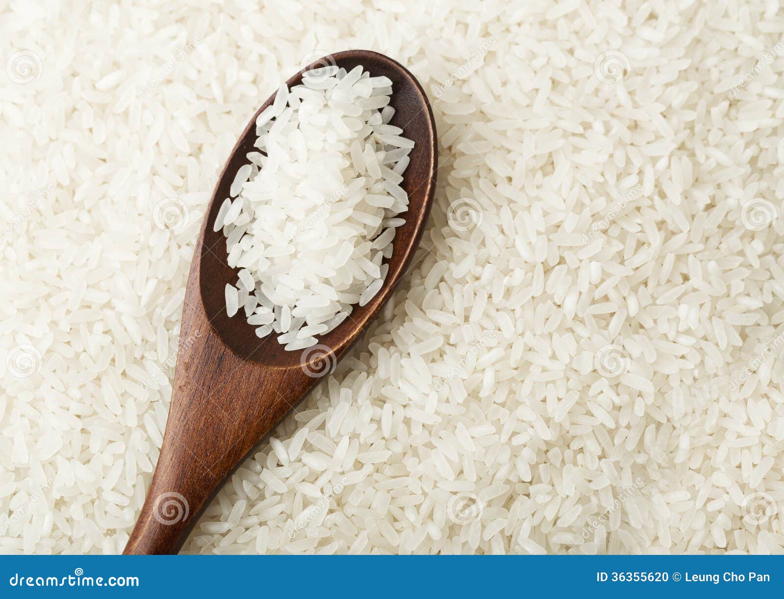 White rice on spoon stock photo. Image of grain, wood 36355620