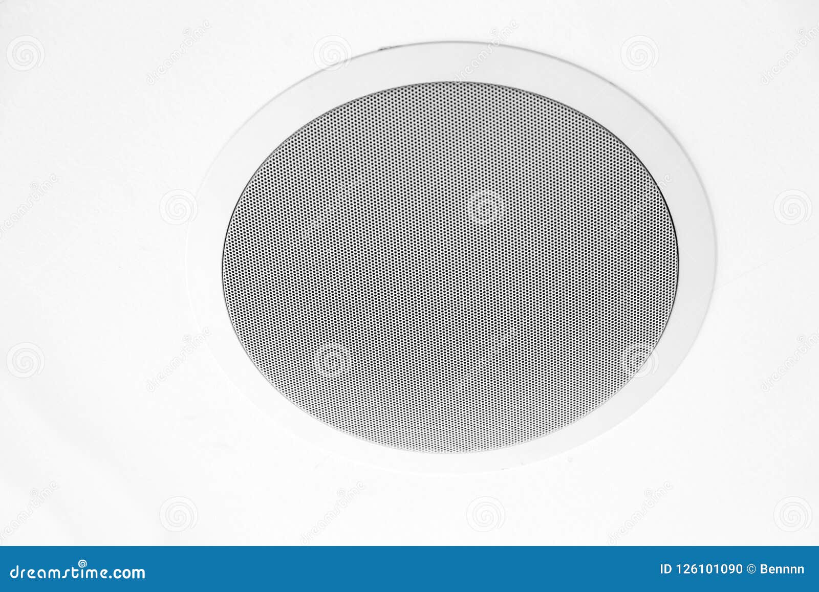 White Speaker And Grille Hanging On White Ceiling Stock