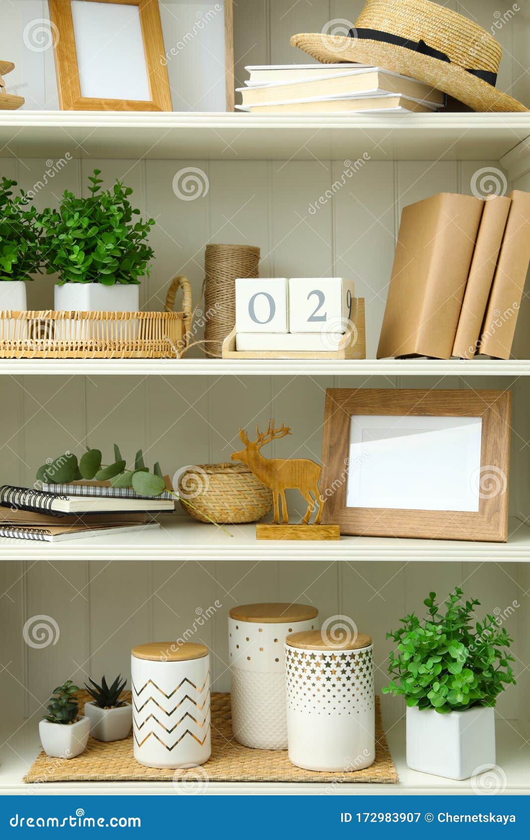 White Shelving Unit with Different Decorative Elements Stock Image