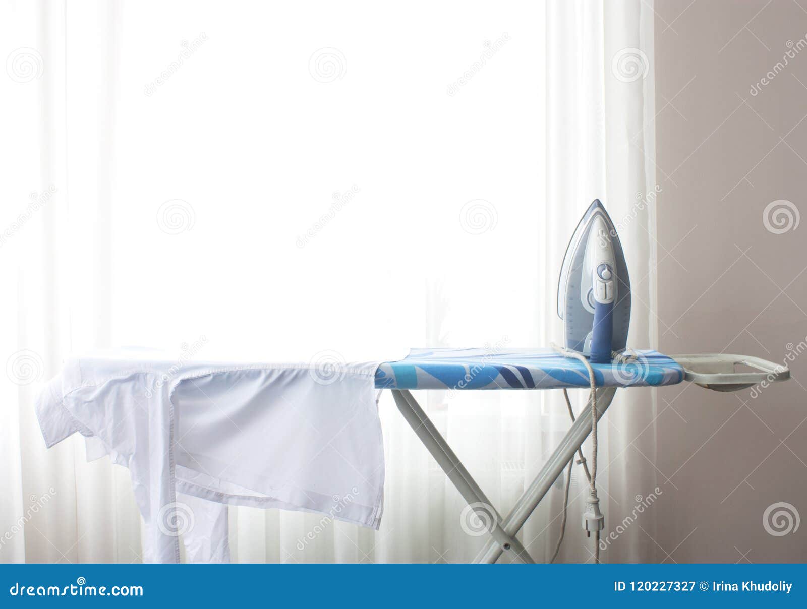 Shirt on the ironing board stock image. Image of ironing 120227327