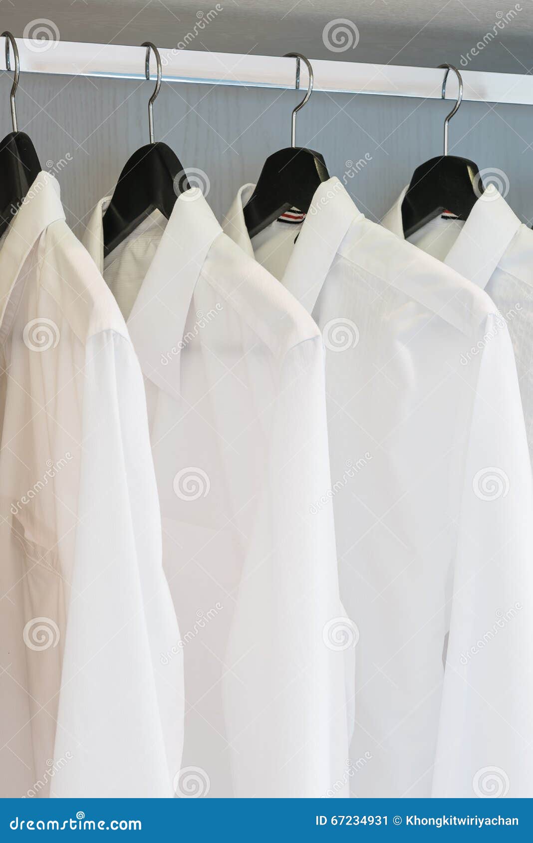 White Shirts Hanging on Rail Stock Image - Image of unisex, textile ...