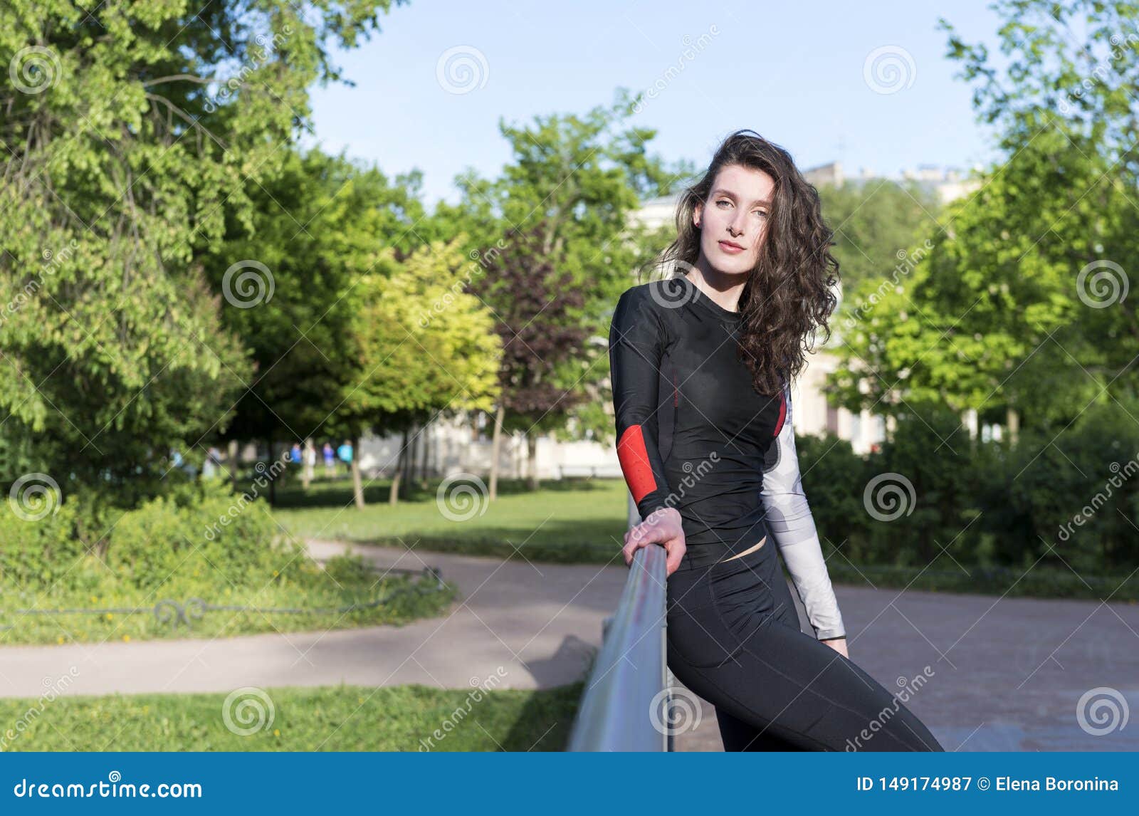 1 White Beautiful Slender Brunette Girl With Long Wavy Hair In