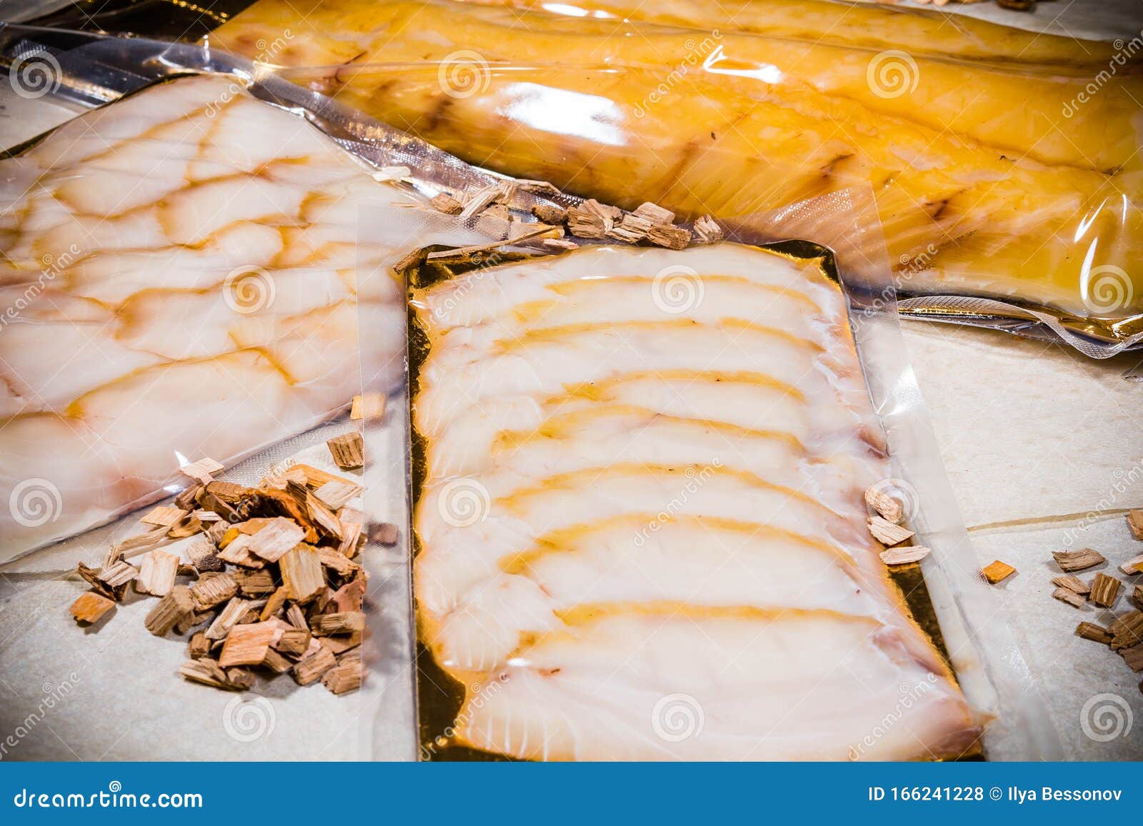 White Smoked Fish in a Sealed Vacuum Package on the Background of a