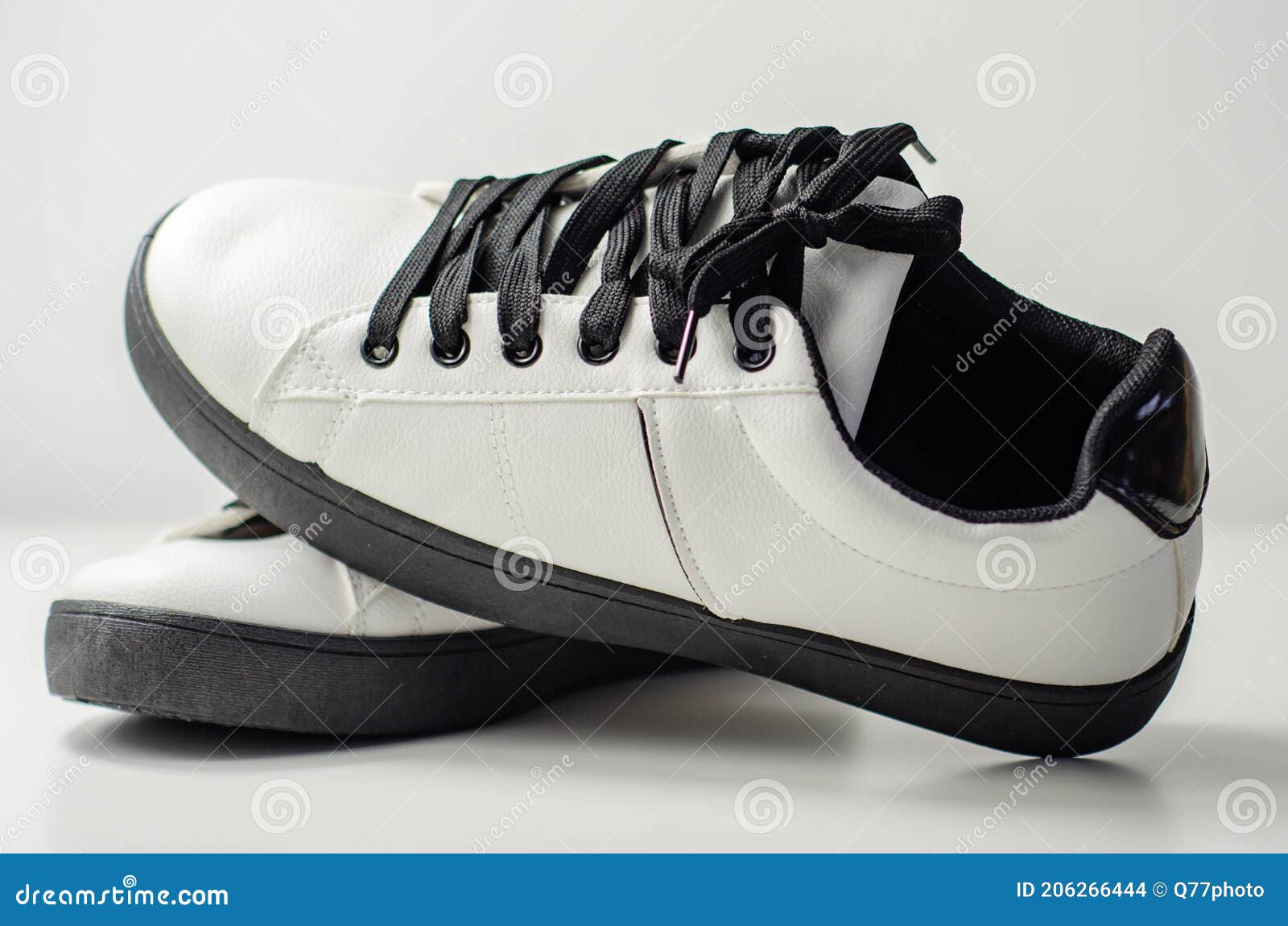 White Sneakers with Black Laces, Classic Sports Shoes Stock Photo ...