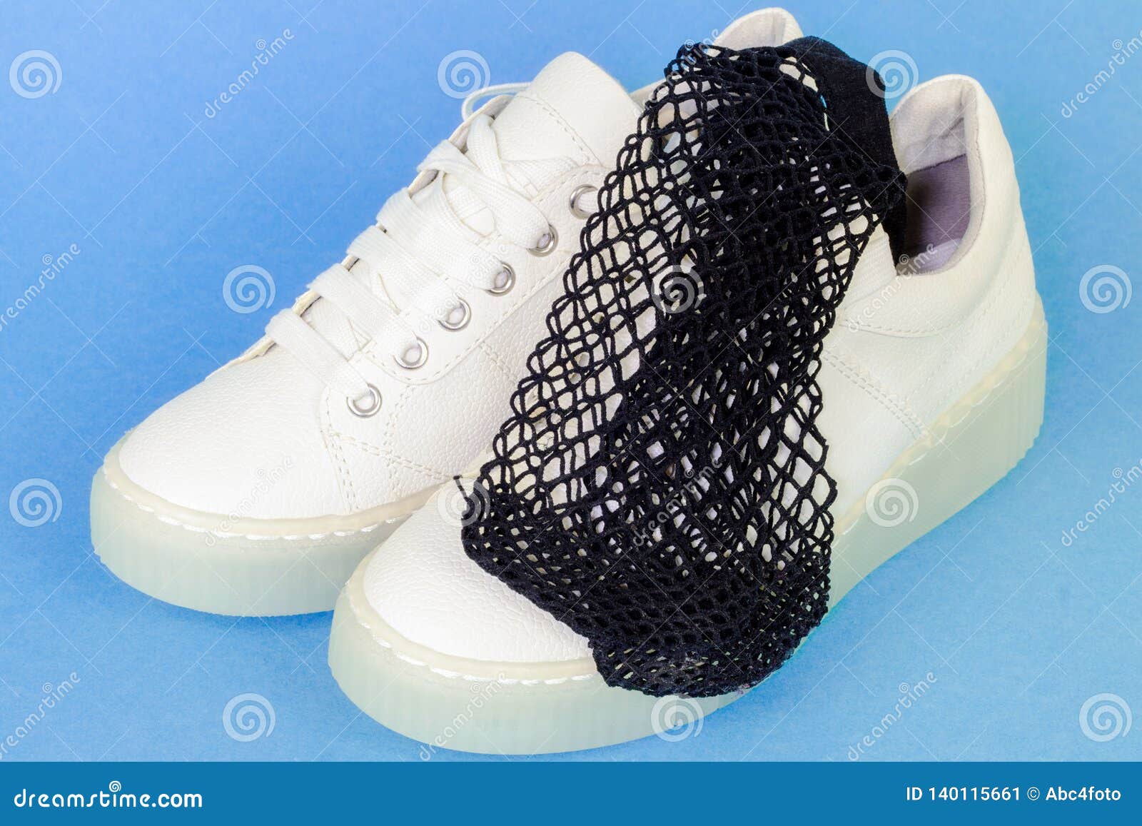 fishnet socks and sneakers
