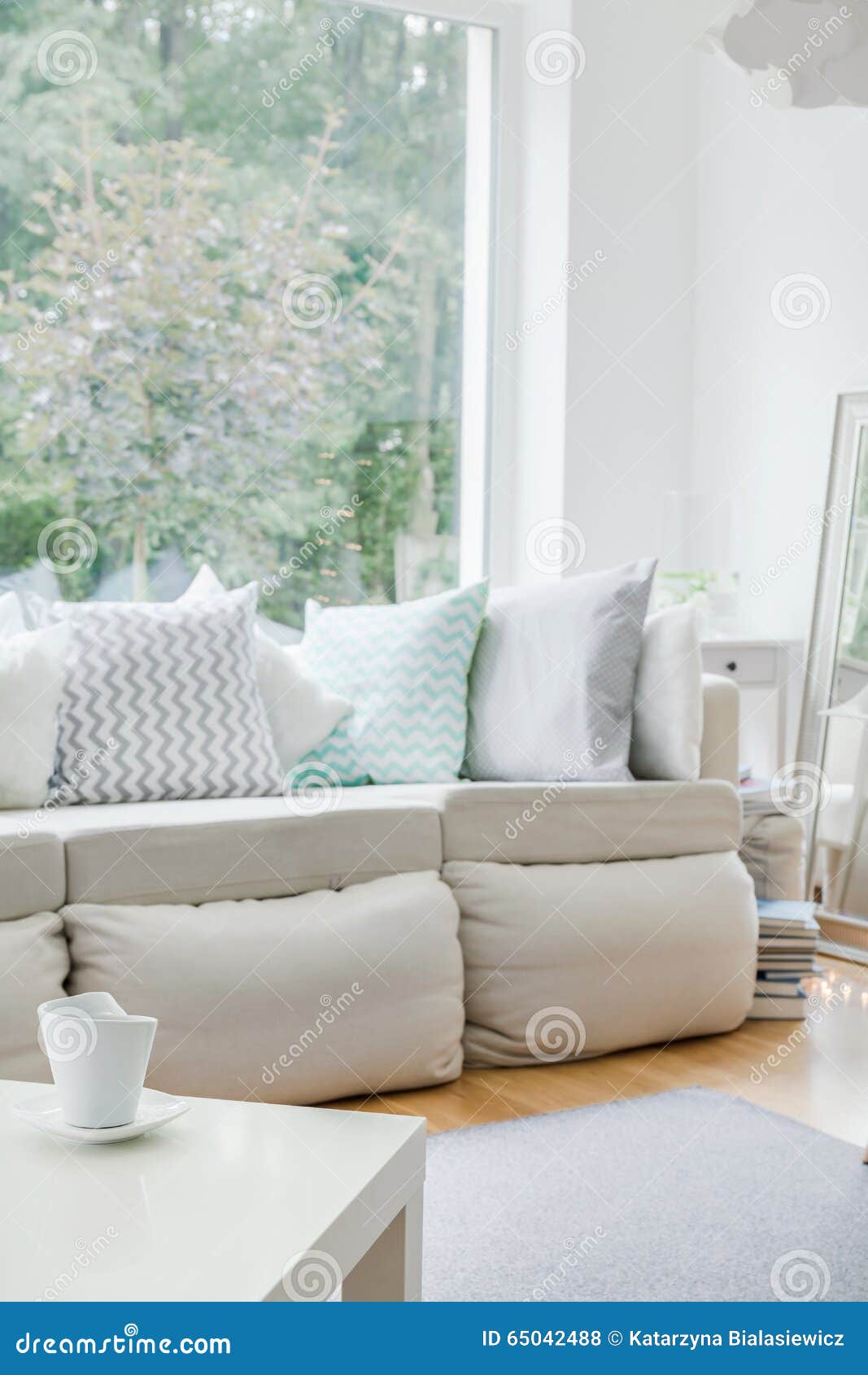 White sofa with cushions stock photo. Image of comfortable 65042488