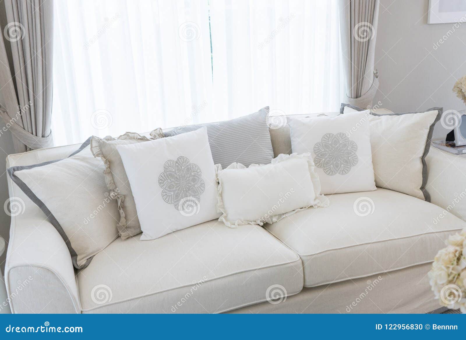 beige and white cushions