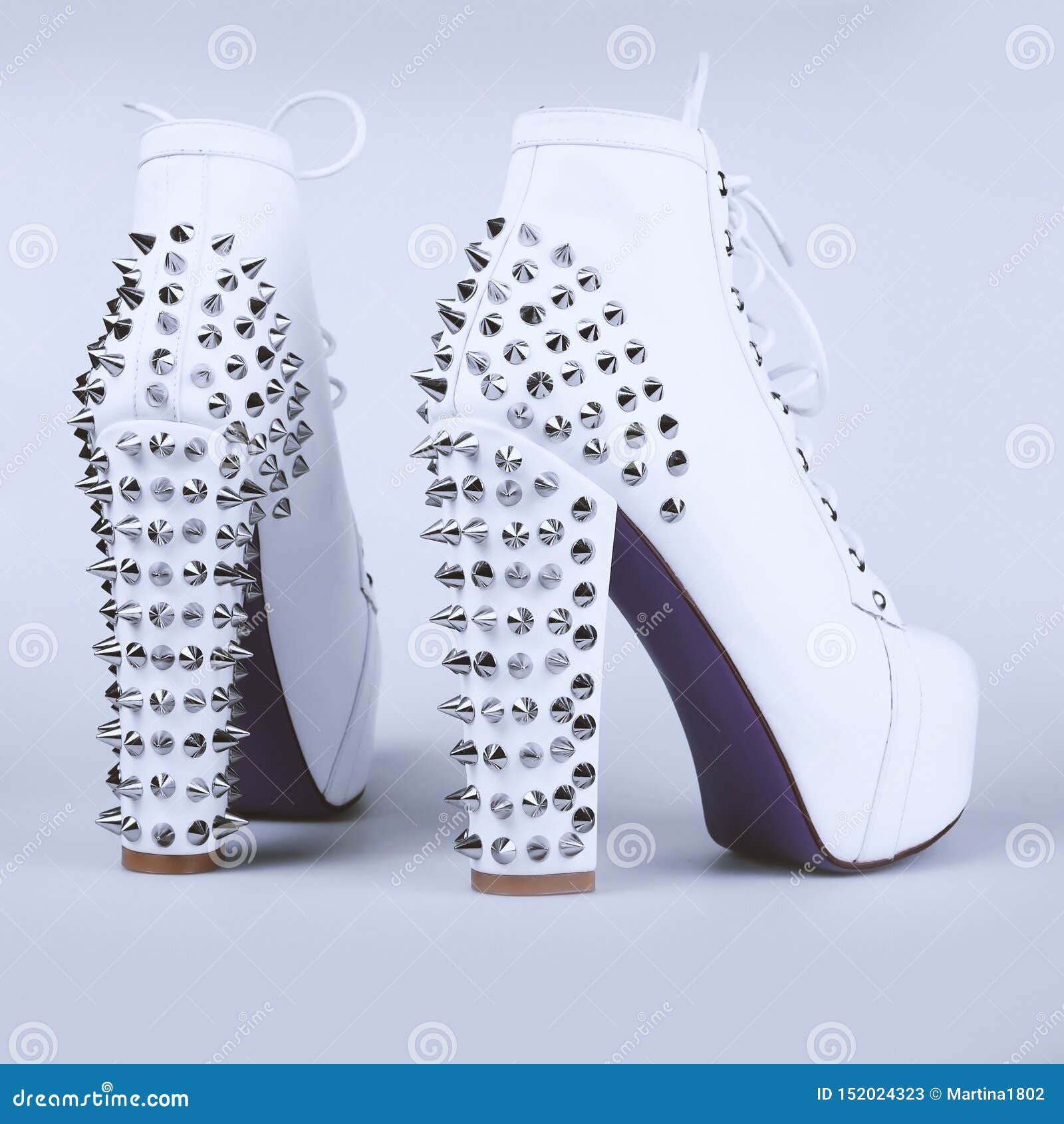 white spiked heels