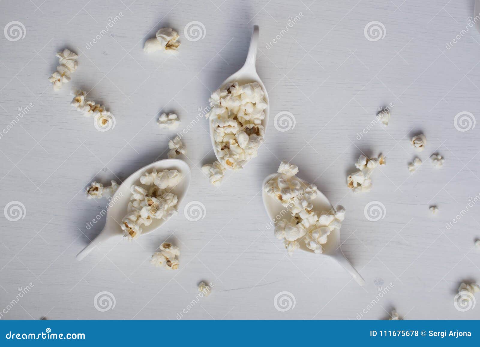 White spoon with popcorn. stock photo. Image of cuchara 111675678