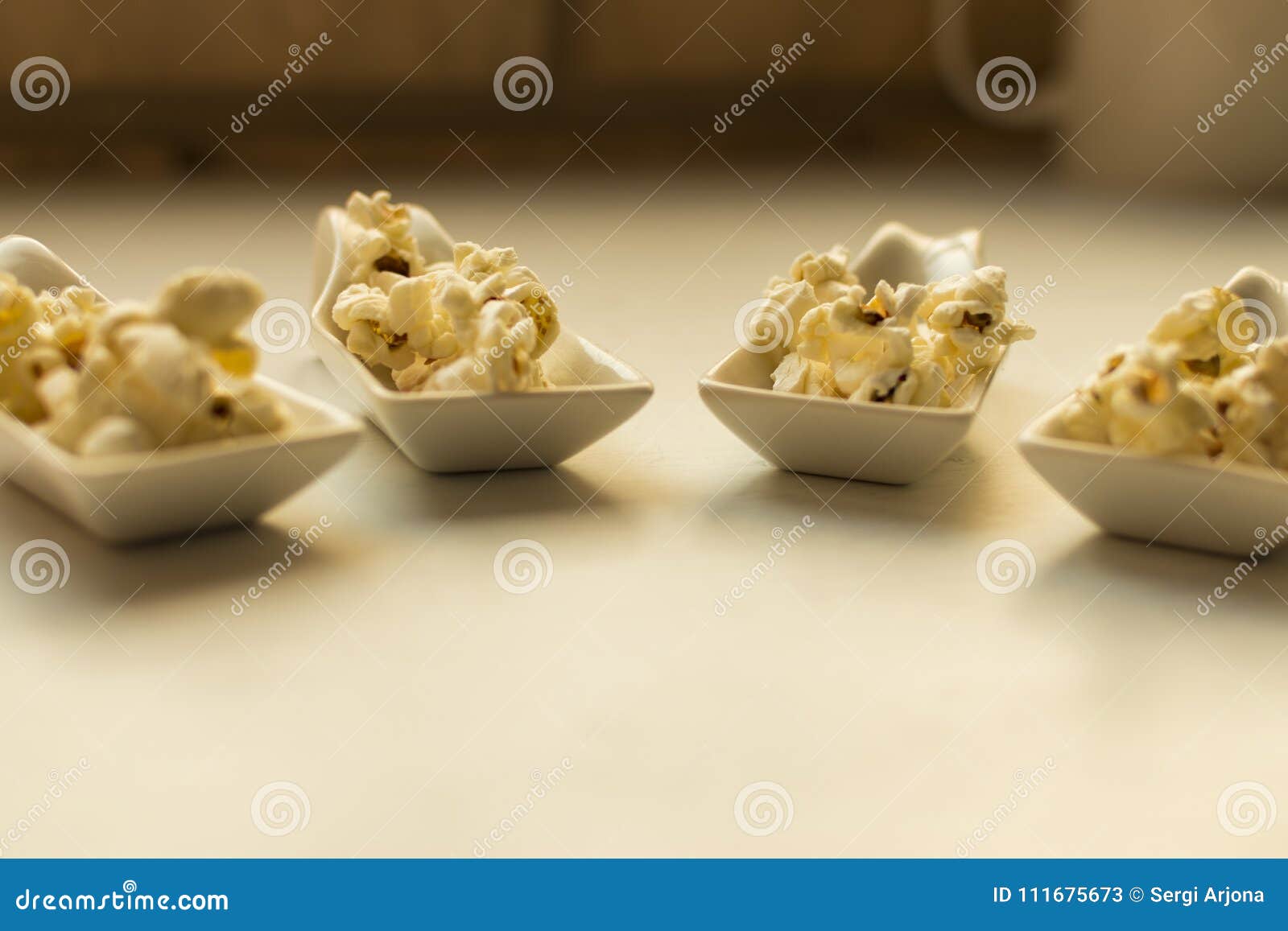 White spoon with popcorn. stock image. Image of entertainment 111675673