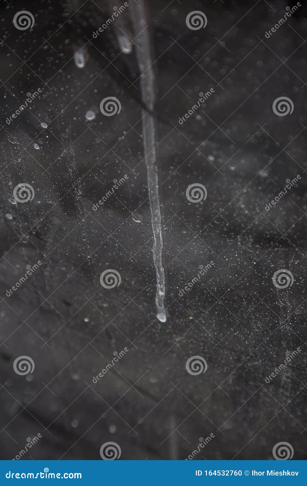 White Spots on Black Glass for Texture and Design Stock Photo Image