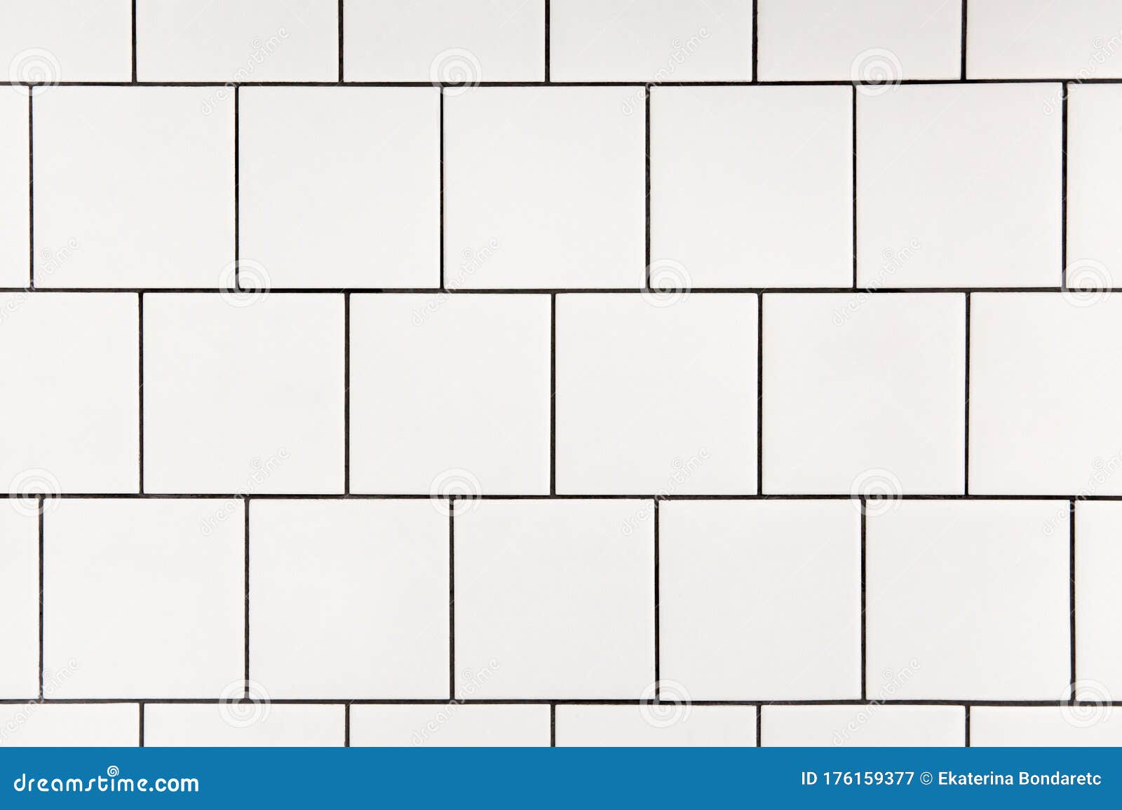 white square ceramic tile with black seam, located horizontally. abstract background, ceramic texture.