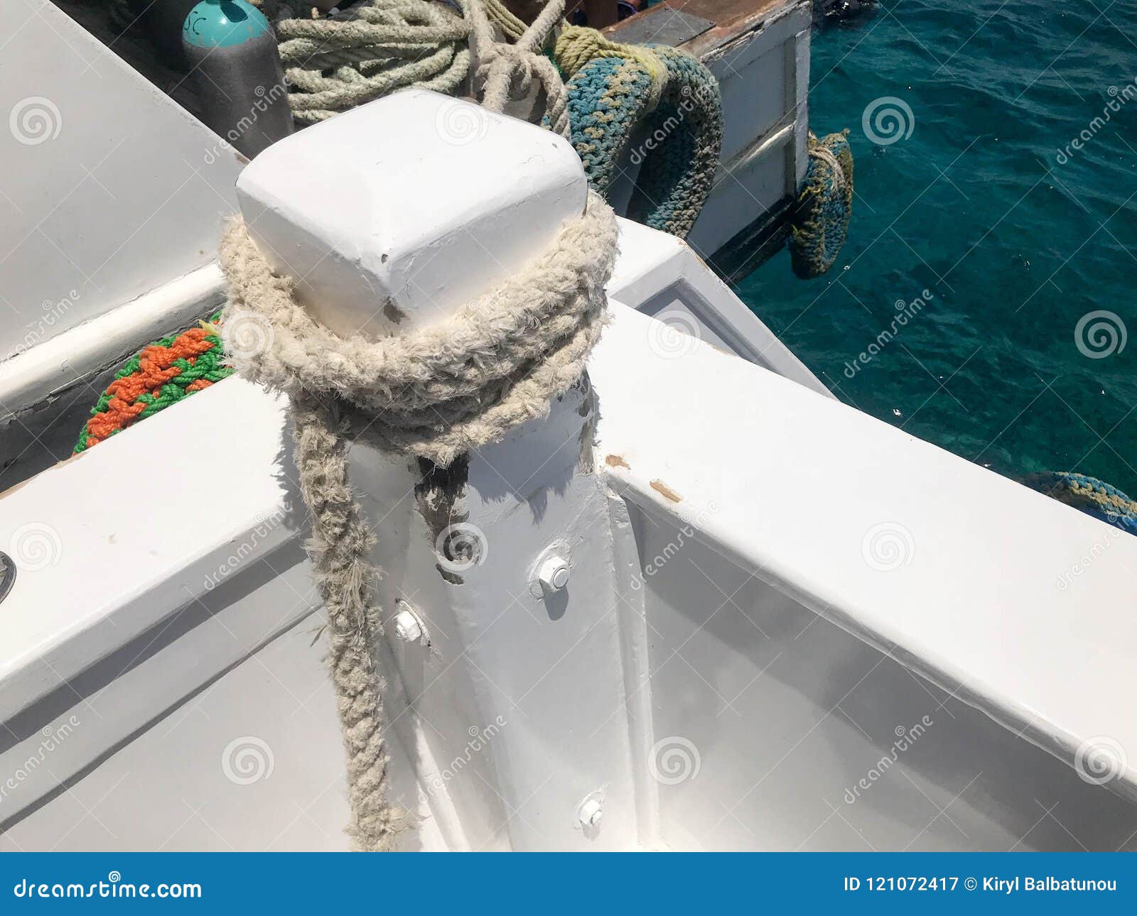 White Strong Durable Thick Fabric Ship Rope, a Rope for the Berth, a Stop  Attached To the Ship, a Boat on the Background of the Bl Stock Image -  Image of harbor