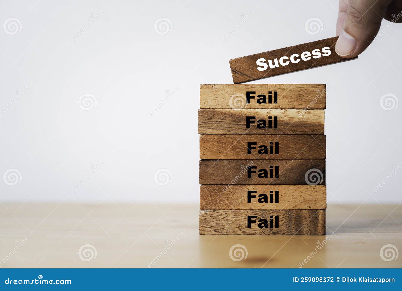 white success wording stacking on top of many fail wording for positive mindset and effort can make successful concept