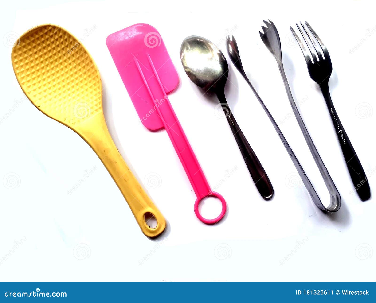 White Surface with Kitchen Utensils Equipment Spoons and Forks Stock