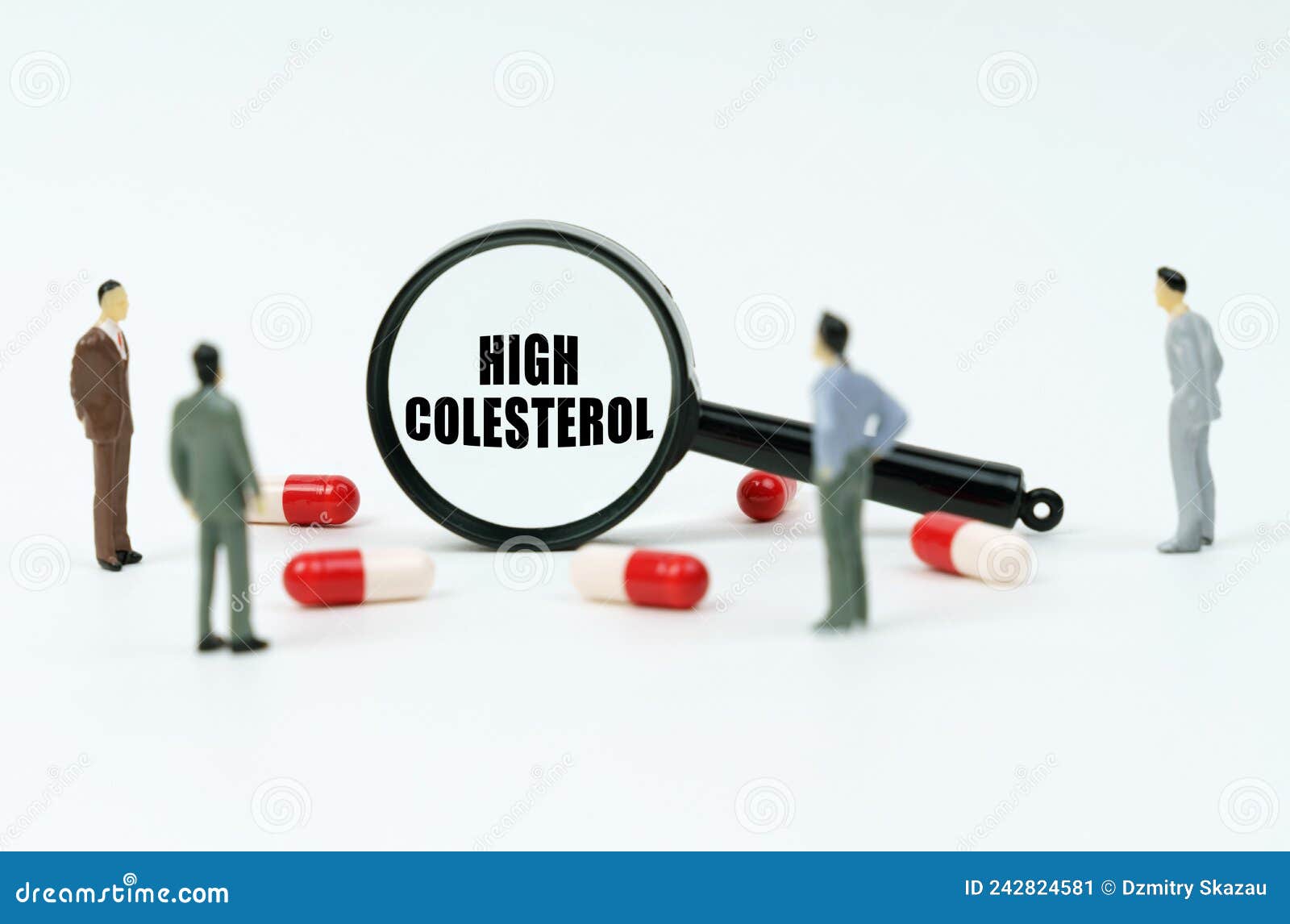 on a white surface are pills, figurines of people and a magnifying glass with the inscription - high colesterol