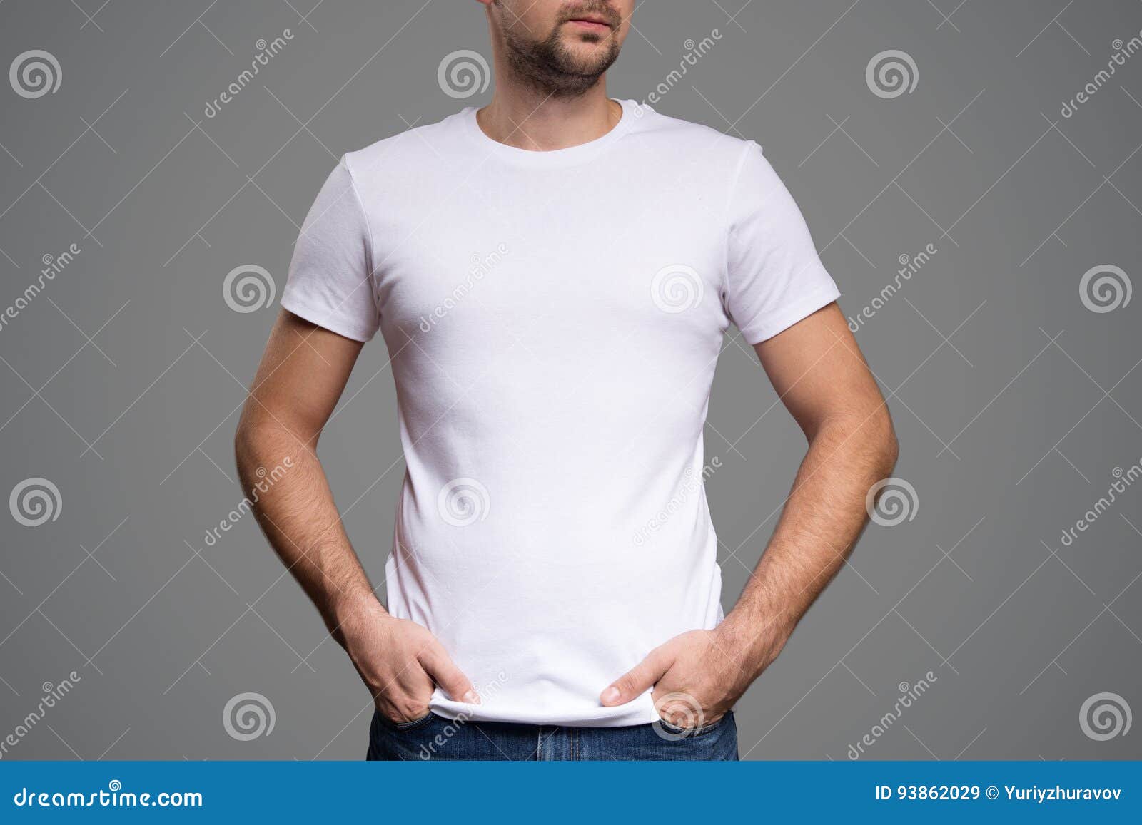 White T-shirt on a Young Man Template. Gray Background. Stock Image ...
