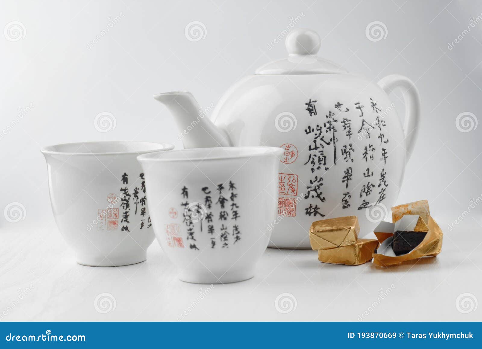 White Teapot with Cups and Black Puerh Editorial Stock Image Image