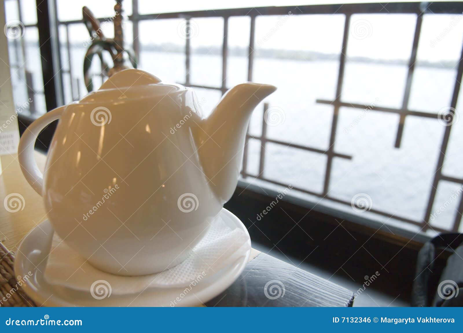 White Teapot on a Table in Restaurant Stock Photo Image of domestic