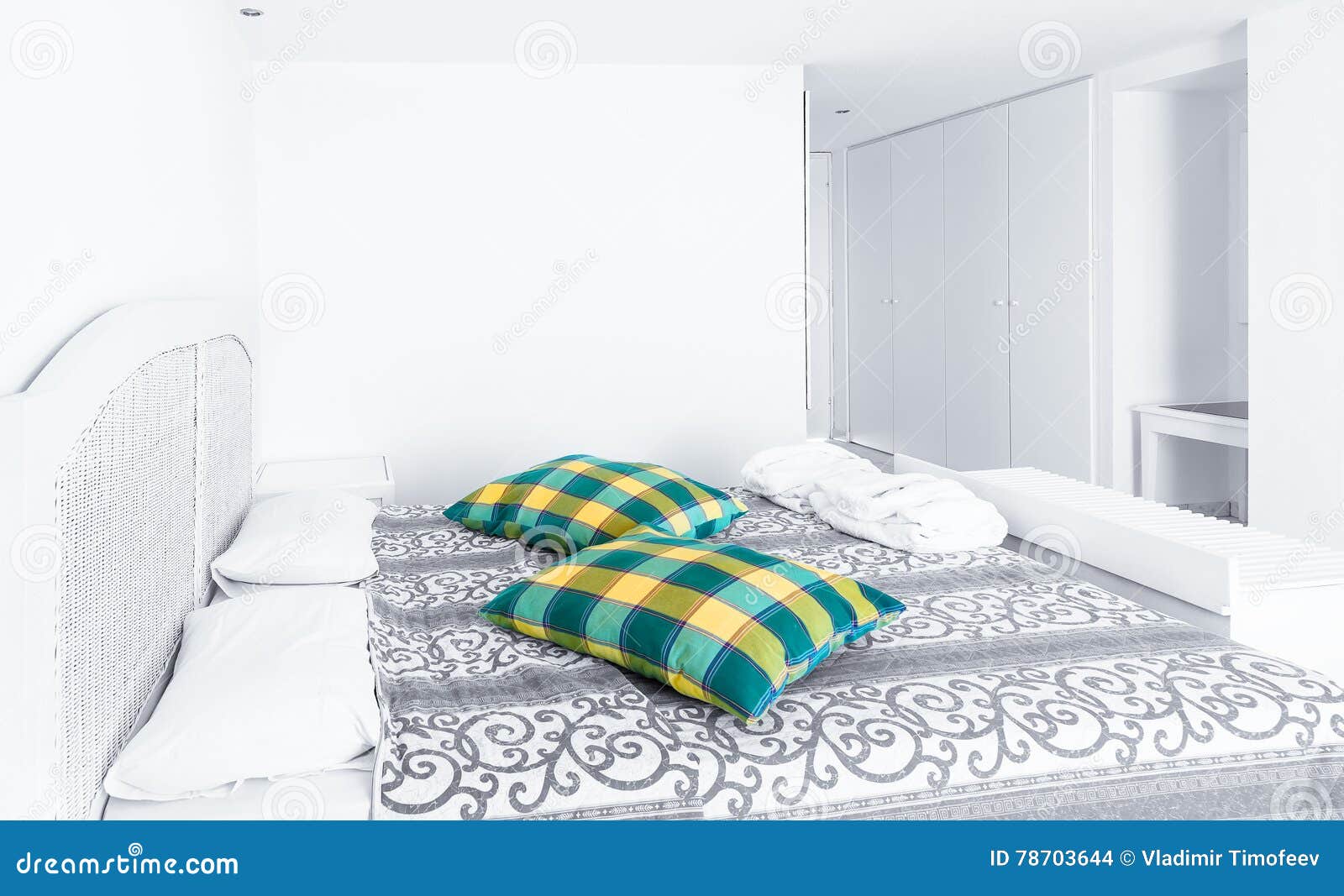 White Themed Bed Sheets and Curtain in Morning, Bedroom Interior. Stock