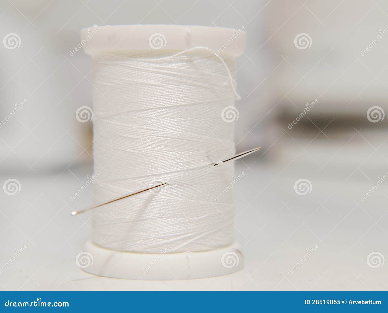 White thread on spool stock image. Image of industry - 28519855