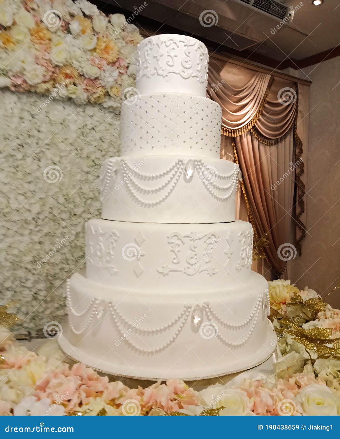 5 Tiered Buttercream Iced Wedding Cake - A Little Cake