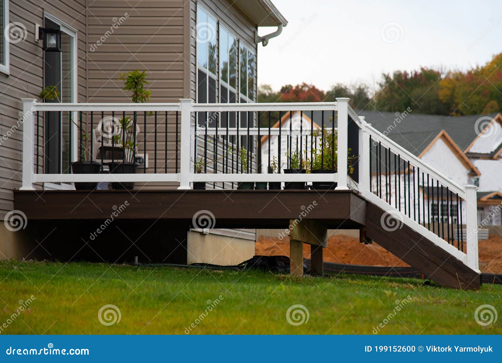 white veranda and railing posts