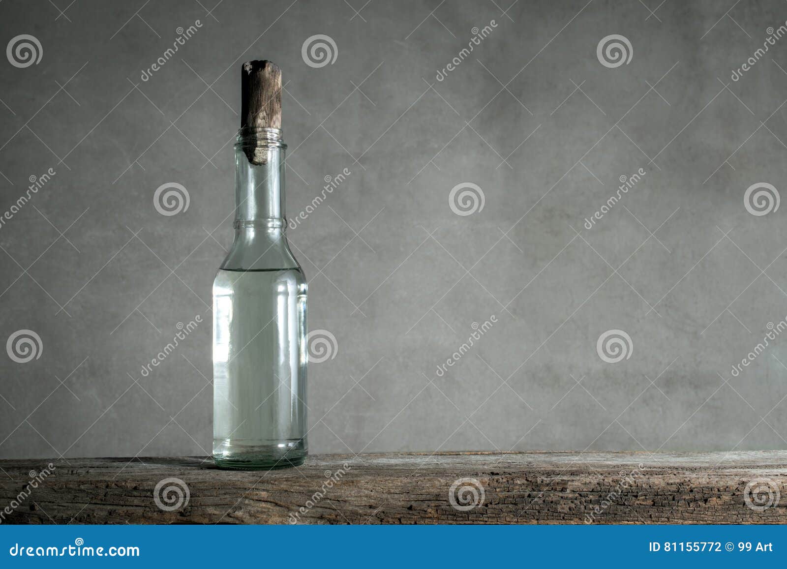 White Vinegar Bottle on Wood Table with Copy Space and Modern Wa Stock